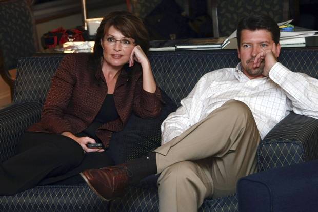 Alaska Governor Sarah Palin and husband Todd watch the final 2008 presidential debate. Weeks earlier, Ms. Palin appeared in the most widely-watched vice-presidential debate in history.