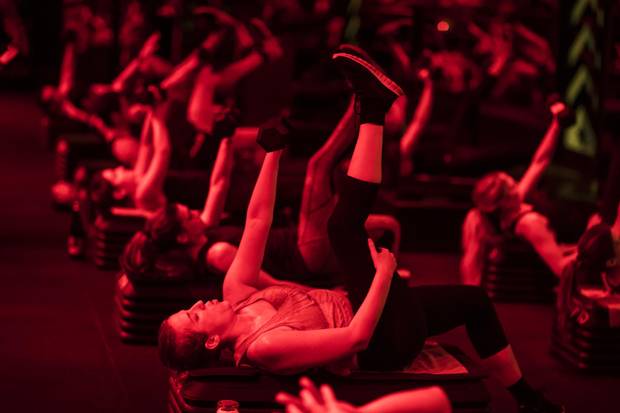 Barry’s 50-minute workouts alternate high-intensity cardio with strength training to provide a challenging full-body workout.