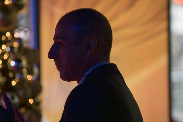 Matt Lauer watches the Today show crew conclude filming in New York, on Dec. 12, 2014.