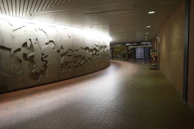 The warren of pedestrian tunnels under Portage and Main includes a concrete sculpture wall by Bruce Head.