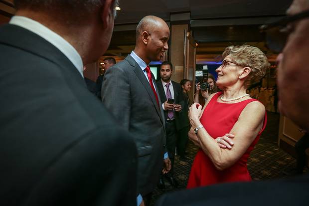 Mr. Hussen talks with Ontario Premier Kathleen Wynne at the Arirang Gala.