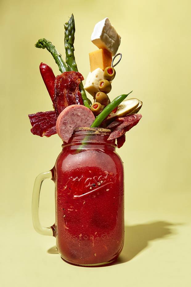 GARNISH OPTION #1: The Butcher Shop Caesar (One-Eighty Sports Pub, Peterborough, Ont.). Sriracha celery salt for rim; Franz’s Gold Medal thick-cut double smoked bacon and house kielbasa; Franz’s beef jerky and pepperette; old cheddar, jalapeño havarti and triple-cream brie; pickled asparagus, spicy bean, dill pickle and olives.