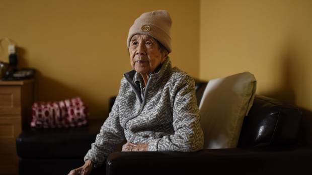 Foon Hay Lum poses for a photo in her room at her retirement home in Toronto on January 13, 2017.