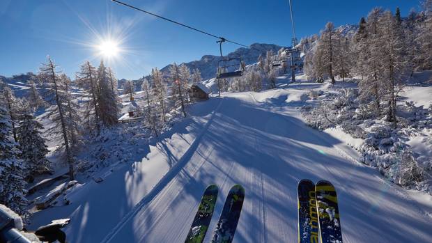 Riding a chairlift at Vogel.