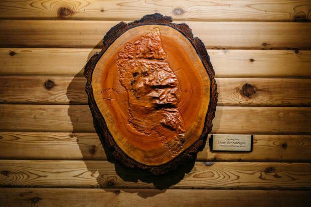 A topographical map of Calvert Island, B.C., where the Hakai Institute is located, hangs in the Hakai lobby.
