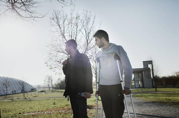 Basel and Osama Omran outside the refugee camp in Neubiberg.
