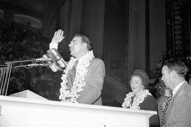 Third ballot winner: A lei about his shoulders, Governor Thomas E. Dewey of New York smiles at cheering delegates as he appears at the convention hall in Philadelphia in 1948.