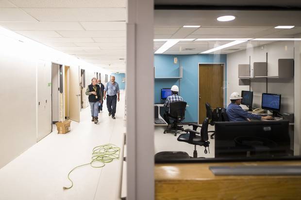 In the halls of Humber River Hospital’s Finch site, shown on Dec. 5, messages in green painter's tape note the renovation work that remains to be done. On Dec. 10, the site is reopening as the Reactivation Care Centre.
