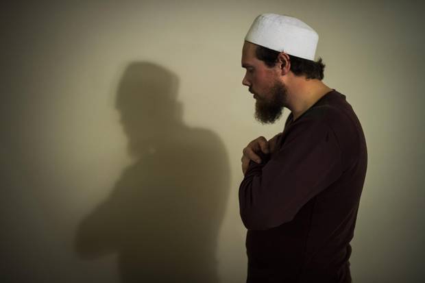 David Bathurst at his home in Burnaby in iDecember, 2015, during prayers.