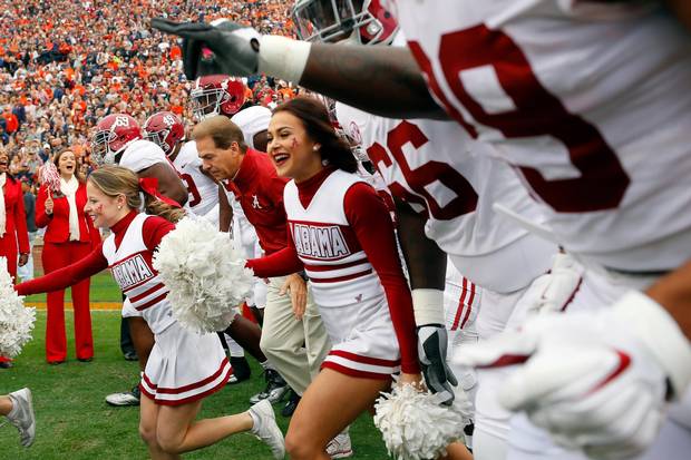 Head coach Nick Saban of the Alabama Crimson Tide leads his team on the field prior to the game against the Auburn Tigers at Jordan Hare Stadium on November 25, 2017 in Auburn, Alabama.