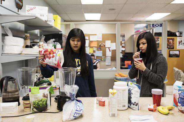 Marleah Atlookan pours frozen fruit into a blender as she makes a smoothie during a life-skills class. Marleah’s career goal is to be an executive chef at a restaurant.