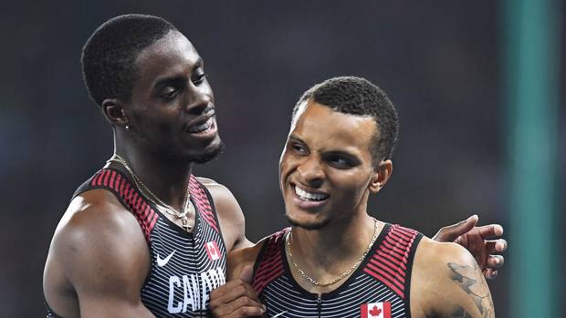 Canada's Andre De Grasse, right, and Brendon Rodney react following the men's 4x100-metre relay final at the 2016 Summer Olympics in Rio de Janeiro, Brazil on Friday, August 19, 2016.