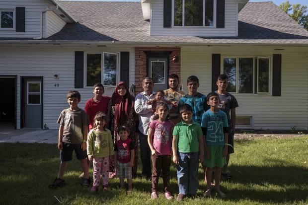 Mohamad Hamam and his wife, Widad Dalala, arrived with their 11 children, a single suitcase and the clothes on their backs. In Syria, Mr. Hamam was a mason, and says he and his wife opted to leave to avoid seeing their sons caught up in the fighting.