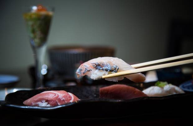 Tetsu Sushi Bar in Vancouver offers more traditional plates such as the five-piece sushi plate in the daily omakase, seen above, or more adventurous appetizers such as the fish roe.