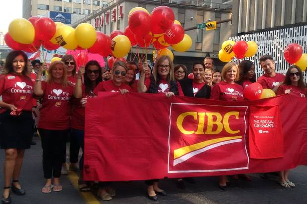 Canadian Imperial Bank of Commerce employees are involved in a variety of community initiatives, such as fundraising for cancer research and children’s charities. Here, they march in the Calgary Stampede parade.