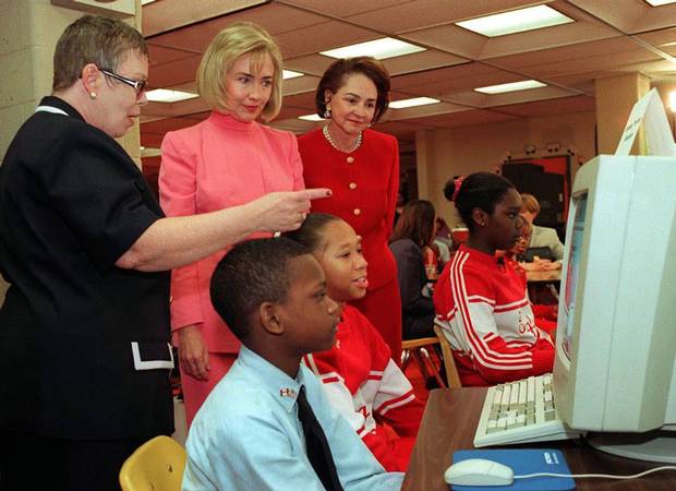 First Lady Hillary Clinton and Aline Chretien view a demonstration of SchoolNet, a digital education tool, during a tour of Burrville Elementary School in Washington, D.C. in April, 1997.