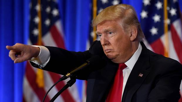 U.S. president-elect Donald Trump calls on a reporter during a press conference Jan. 11, 2017, at Trump Tower in New York.