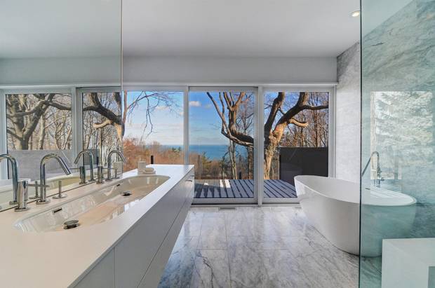 Ample windows around the home provide an expanded lakeside view.