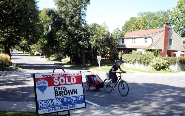 September 12, 2016 - Way Home Series - Real estate: A sold sign is pictured in the neighbourhood of Westboro in Ottawa.