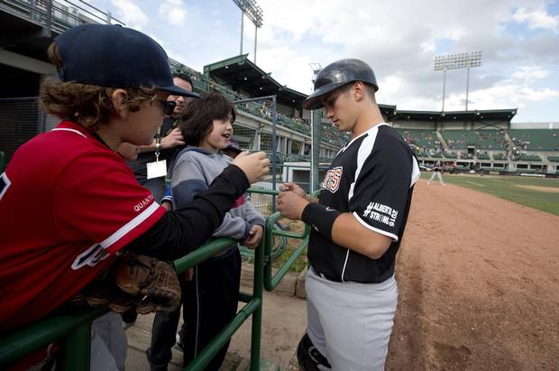 Fort McMurray Giants’ Josh Iannetti signs autographs for fans before taking on the Edmonton Prospects in Edmonton on May 28, 2016. It's the Giants first game in their borrowed stadium since the wildfires in Fort McMurray.