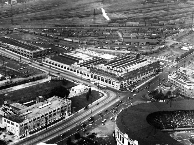 Loblaw Groceterias, the company’s head office and warehouse, circa 1940. Maple Leaf Stadium appears in the foreground.