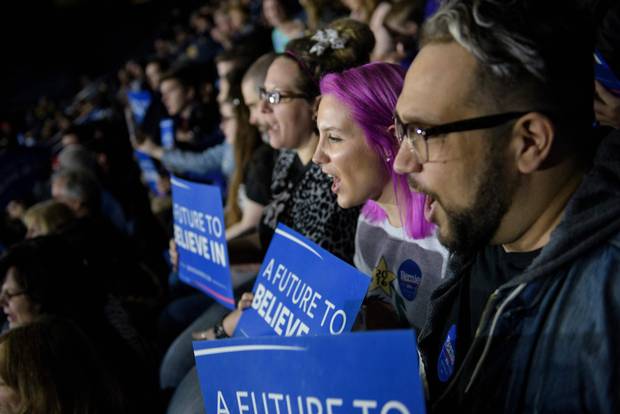People wait to hear US presidential hopeful Senator Bernie Sanders speak during a rally in Youngstown, Ohio.