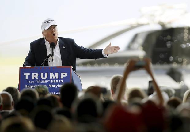 Donald Trump speaks at an airport hangar campaign rally in front of his personal helicopter in Hagerstown, Maryland, ahead of the Apr. 26 primary.