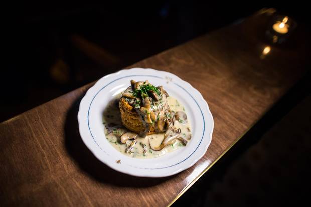 Vol-au-vent aux champignons and sauce, mornay mushroom in a white sauce with puff pastry shell.