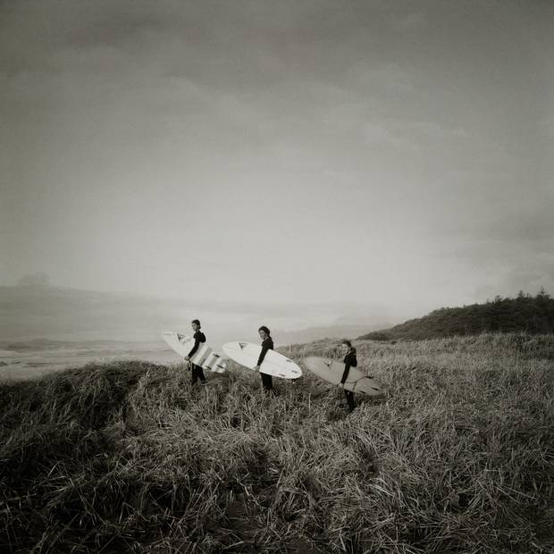 Born and raised in Tofino, Sarah Sloman, middle, first tried surfing when she was 13 years old. She remembers her mom ordering a custom-made two-piece wetsuit, but by the time it arrived in the mail, she had already outgrown it and lost interest. It wasn't until she was 19 that she fully committed. ‘I never stopped after that,’ she said. Now, her main surfing companions are her 13-year-old twin daughters Serena, right, and Jasmine Porter. ‘I think it's pretty cool because we have a lot of people to look up to here,’ said Jasmine, who recently landed a sponsorship deal with XCEL. ‘When my mom was growing up there wasn't really anybody older than her that surfed.’