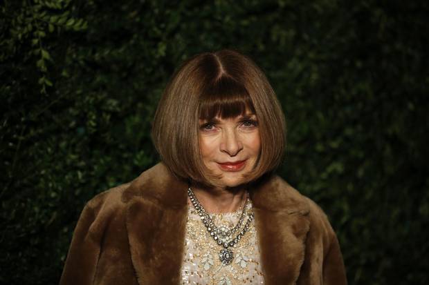 Editor-in-chief of American Vogue Anna Wintour poses on the red carpet as she attends the 60th London Evening Standard Theatre Awards 2014 in London on November 30, 2014.
