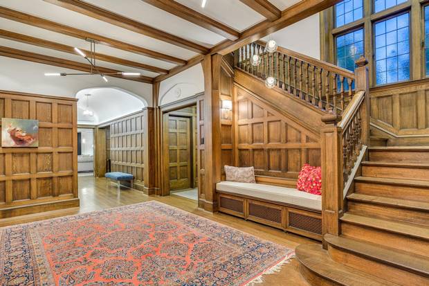 The renovation involved incorporating an in-floor heating system without damaging the original hardwood.