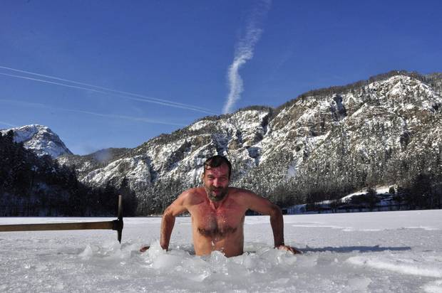 Wim Hof of the Netherlands, known as the Iceman, prepares for a performance in a tank of ice for German Television, in Inzell, Germany.