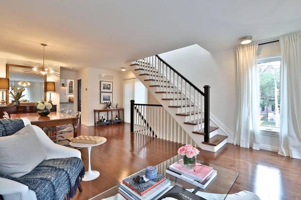 Their first moves in renovating the townhome included replacing the carpet with hardwood floors and ripping out an old floor-to-floor intercom