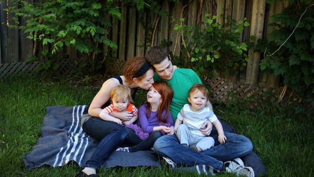 Jill Promoli McGee, above left, and Craig McGee lost one of their twin boys, Jude (left), after he became ill with the flu. 