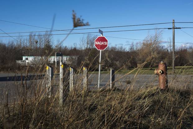 A stop sign in Paqtnkek Mi'kmaw Nation.