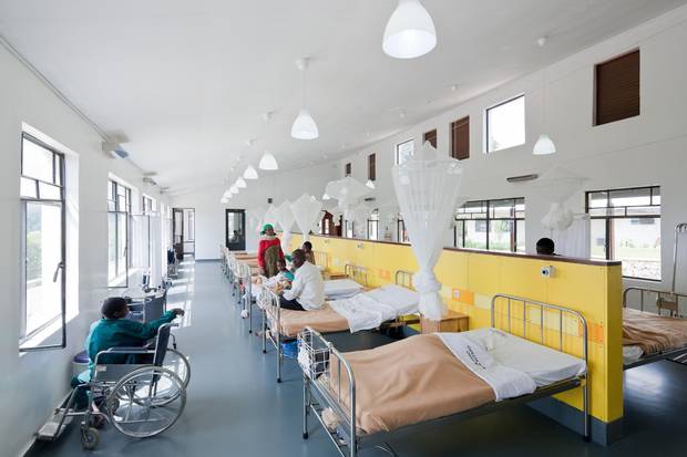 Top, middle: Butaro Hospital, opened in Rwanda’s Northern Province in 2011 and designed by MASS, features high ceilings and large windows, natural ventilation and local materials. Bottom: MASS also designed this library for African Rural University in Uganda.