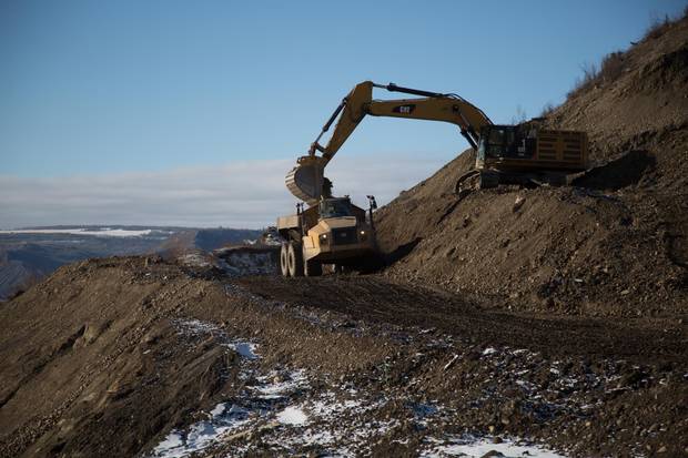 Construction equipment on the north bank of the Site C dam in March, 2017.
