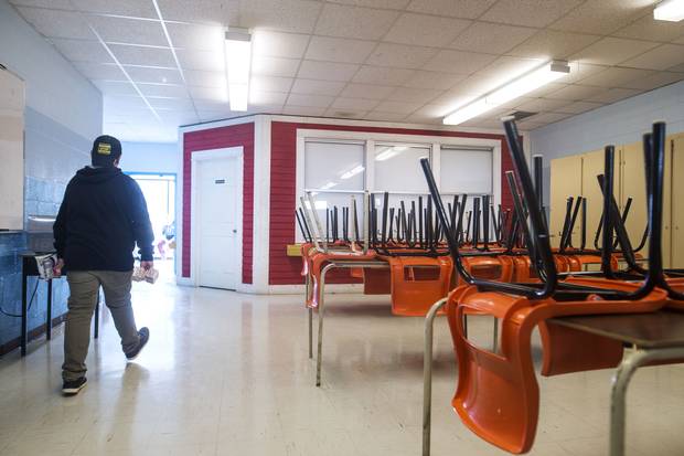 In the cafeteria of St. Michael’s Regional High School, Radio Bell Island has a red-and-white studio space.