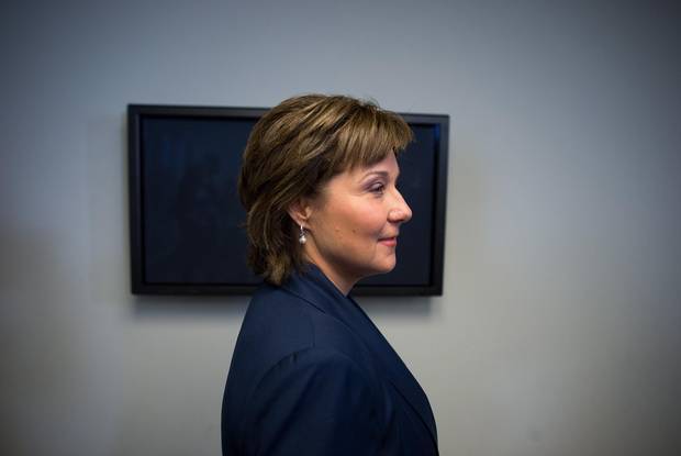 B.C. Premier Christy Clark leaves after a news conference in Vancouver on Tuesday.