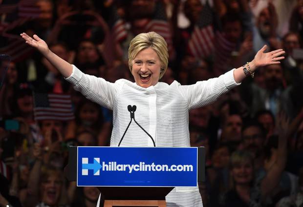 Democratic presidential candidate Hillary Clinton celebrates on stage during her primary night event at the Duggal Greenhouse, Brooklyn Navy Yard, on Tuesday in New York.