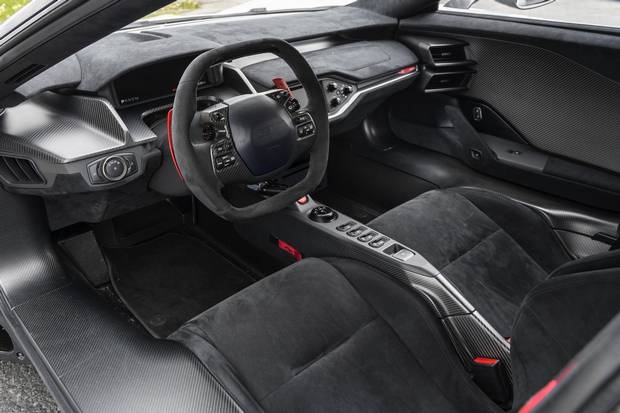 The interiors have a minimalist, track-focused design.