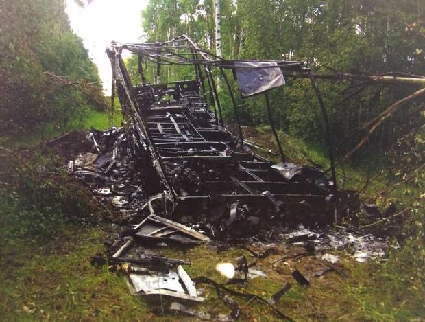 The burnt motorhome belonging to Lyle and Marie McCann is shown in an evidence photo released at the Travis Vader trial.