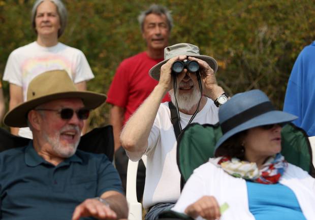 Spectators gather to take in the action.