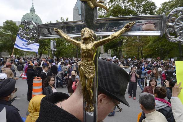 Sept. 14, 2013: Demonstrators take part in a protest against the proposed Charter of Values of the Parti Québécois government of the day. The PQ lost to the Liberals in a 2014 election, where soon-to-be-premier Philippe Couillard campaigned promising secularism legislation similar to Bill 62.