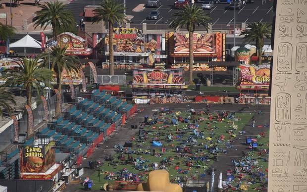 Personal belongings are gathered on the ground at the venue of the Route 91 Harvest festival venue where FBI investigators continue work.