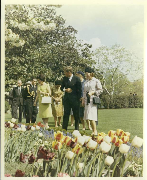President Kennedy shows the Rose Garden to Princess Beatrix of the Netherlands. 