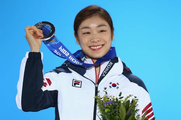 Yuna Kim of South Korea celebrates after winning silver at the Sochi Olympics in 2014.