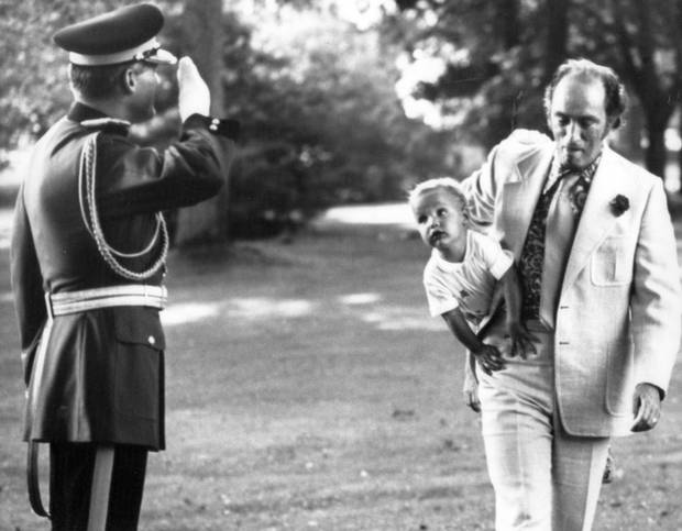 Prime minister Pierre Trudeau cradles a young Justin under his arm in Ottawa on Aug. 10, 1973.