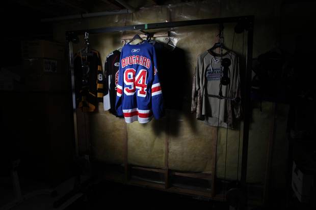 Jersey of late NHL player Dereck Boogaard is on display at his father Len Boogaard's basement gym January 5, 2017 in Ottawa.