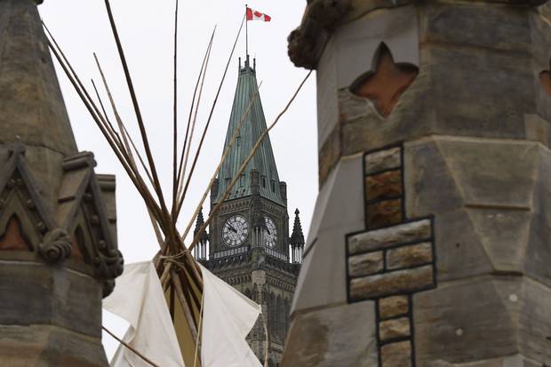 A large teepee, erected by Indigenous demonstrators to kick off a four-day Canada Day protest, stands in front of Parliament Hill in Ottawa on June 29, 2017.